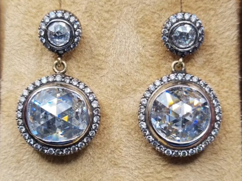 A pair of Victorian earrings featuring 2 pairs of antique rose cut diamonds